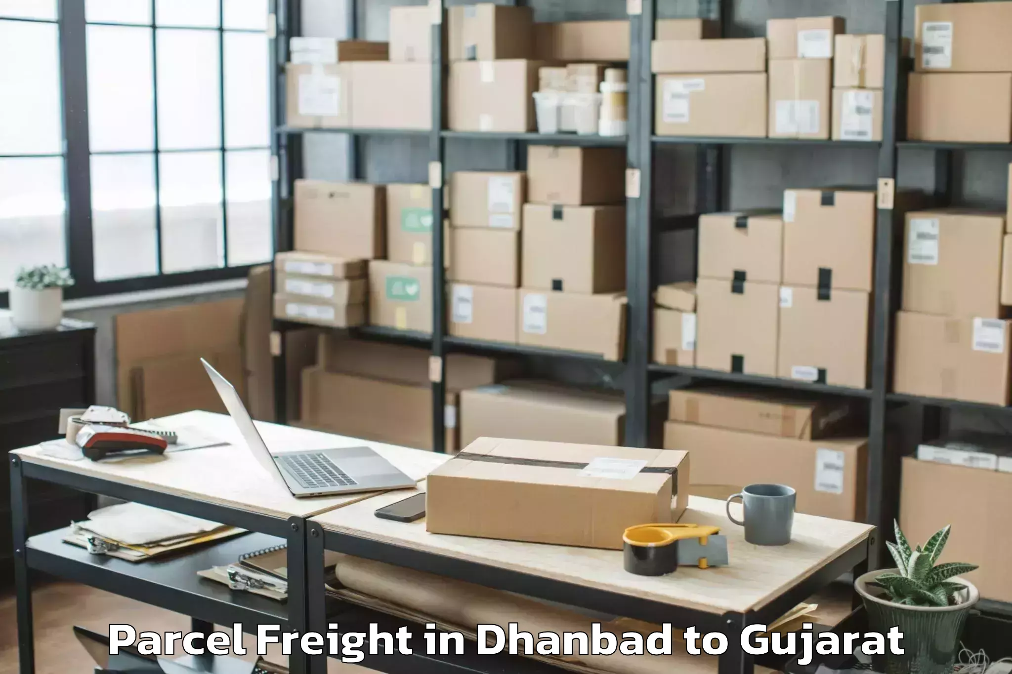 Discover Dhanbad to Karjan Parcel Freight